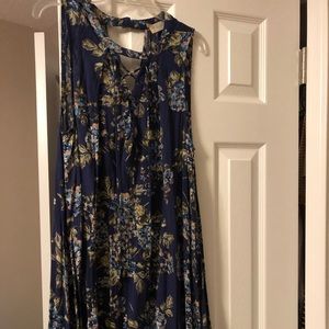 Dark blue sleeveless flowery dress